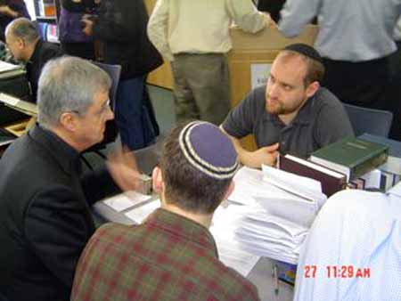 A prelate talking with rabbinic students